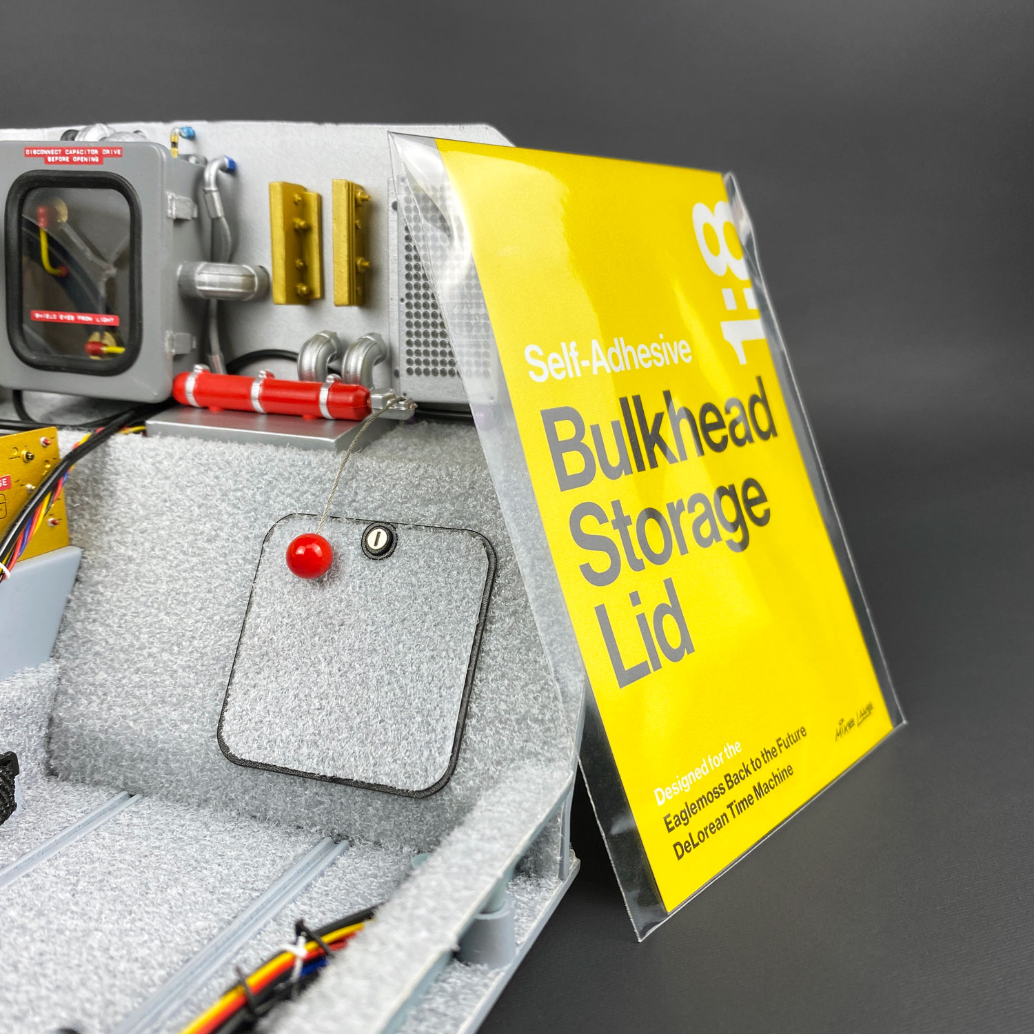 Bulkhead Storage Lid with ‘Bailout’ Ball and Wire